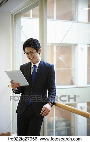 Stock Photograph - confident working business people. Fotosearch