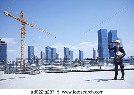 business man looking over the telescope View Large Photo Image Stock Photography - business man looking over the telescope. Fotosearch