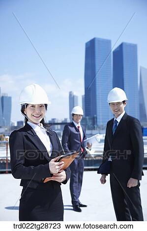 business people at construction site are in confidence View Large Photo Image Stock Image - business people at construction site are in confidence. Fotosearch