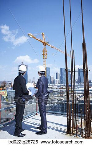 business people at construction site are in confidence View Large Photo Image Stock Photography - business people at construction site are in confidence. Fotosearch