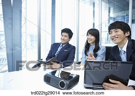 business people working together in office View Large Photo Image Picture - business people working together in office. Fotosearch