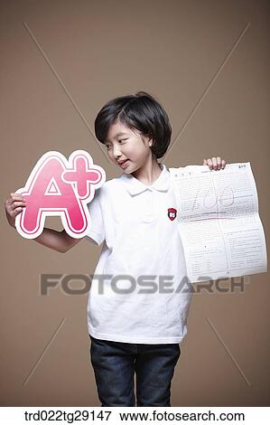 girl get a plus grade View Large Photo Image Stock Photo - girl get a plus grade. Fotosearch