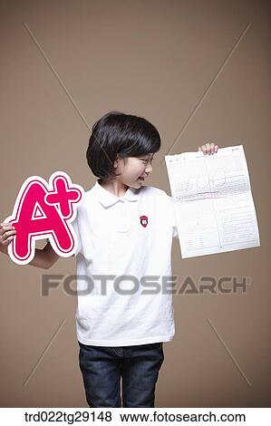Stock Photo - girl get a plus grade. Fotosearch