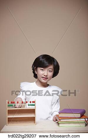 girl using an abacus View Large Photo Image Stock Photo - girl using an abacus. Fotosearch
