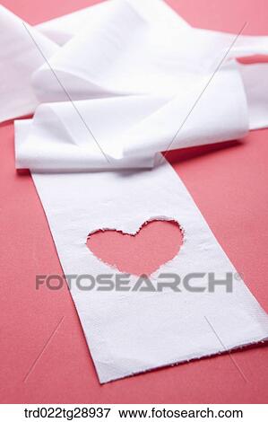 Stock Photo - heart shaped in waste paper. Fotosearch