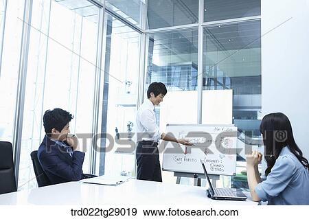 man doing presentation to people in meeting room View Large Photo Image Stock Photo - man doing presentation to people in meeting room. Fotosearch