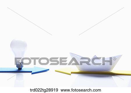 Stock Photo - paper ship and light bulb. Fotosearch