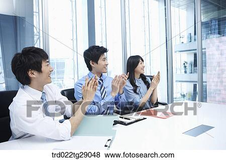 people clapping hands together in meeting room View Large Photo Image Stock Photo - people clapping hands together in meeting room. Fotosearch