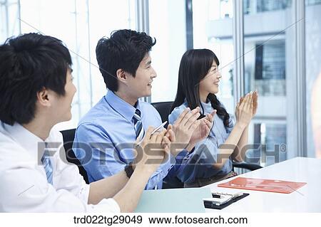 people clapping hands together in meeting room View Large Photo Image Stock Photo - people clapping hands together in meeting room. Fotosearch