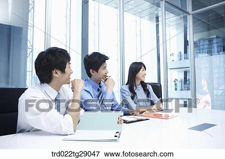 Stock Photo - people take partipate in meeting. Fotosearch