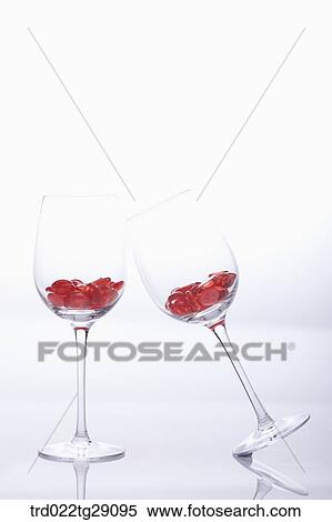 red buttons in wine glass View Large Photo Image Stock Photography - red buttons in wine glass. Fotosearch