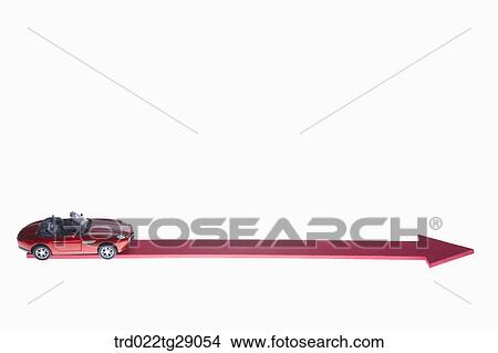 Picture - red minicar and red arrow sign. Fotosearch
