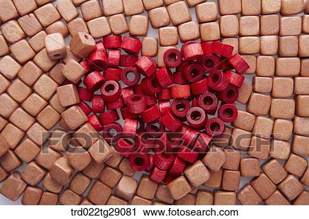 Stock Image - red rolls were arranged in heart shaped. Fotosearch
