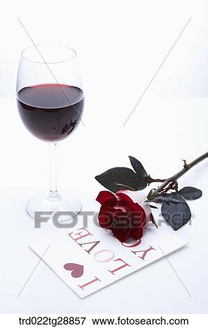 wine and rose with greeting card View Large Photo Image Stock Photo - wine and rose with greeting card. Fotosearch