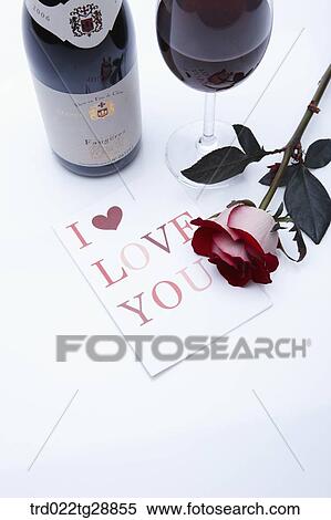 Stock Photography - wine and rose with greeting card. Fotosearch