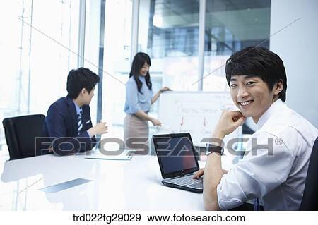woman doing presentation to people in meeting room View Large Photo Image Stock Photo - woman doing presentation to people in meeting room. Fotosearch