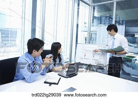 woman doing presentation to people in meeting room View Large Photo Image Stock Photo - woman doing presentation to people in meeting room. Fotosearch