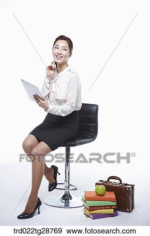 woman holding tablet View Large Photo Image Stock Photo - woman holding tablet. Fotosearch