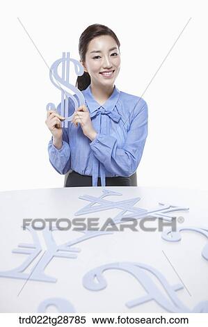 woman picking dollar sign up View Large Photo Image Stock Photography - woman picking dollar sign up. Fotosearch