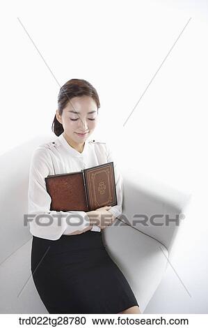 woman was moved by the book View Large Photo Image Stock Image - woman was moved by the book. Fotosearch