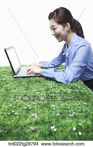 woman working using laptop View Large Photo Image Picture - woman working using laptop. Fotosearch