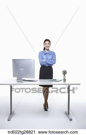 Stock Image - working business woman. Fotosearch