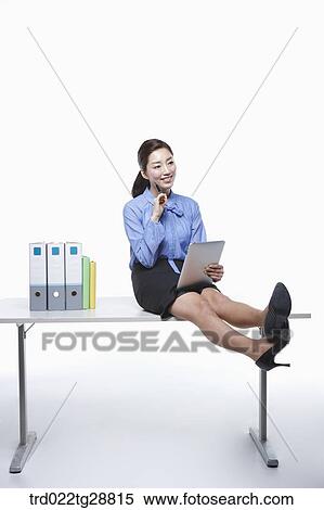 Stock Photography - working business woman. Fotosearch