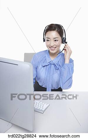 Picture - working woman customer service. Fotosearch
