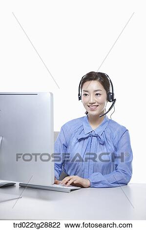 Stock Image - working woman customer service. Fotosearch