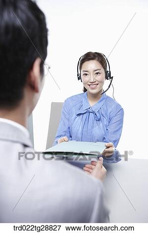Stock Photo - working woman customer service. Fotosearch