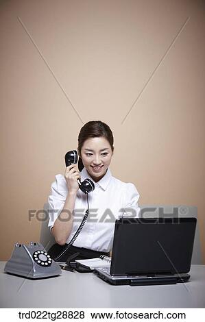 Stock Photo - working woman customer service. Fotosearch