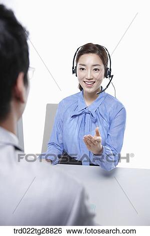 Stock Photograph - working woman customer service. Fotosearch