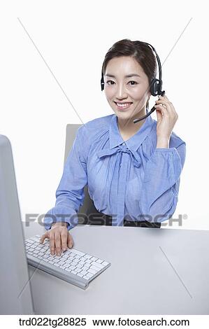 Stock Photography - working woman customer service. Fotosearch