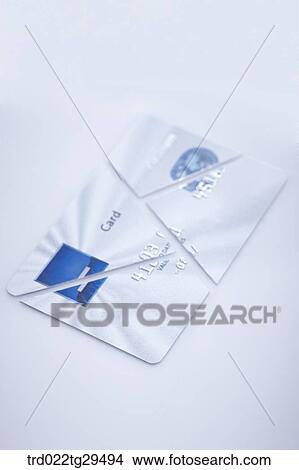 Picture - broken credit card. Fotosearch