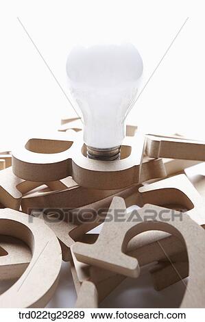 Stock Photo - bulb and alphabet initials. Fotosearch