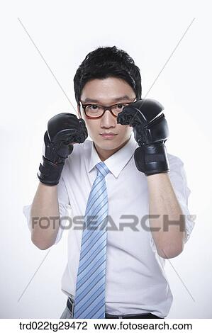 business man defenses wearing gloves View Large Photo Image Stock Image - business man defenses wearing gloves. Fotosearch