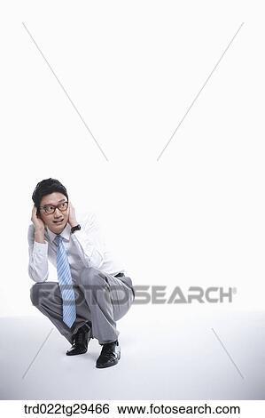Stock Photograph - business man feels horrors. Fotosearch