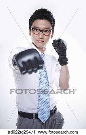 business man outstretched his arms wearing gloves View Large Photo Image Stock Image - business man outstretched his arms wearing gloves. Fotosearch