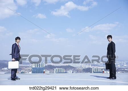 business rivals directly facing each other View Large Photo Image Stock Image - business rivals directly facing each other. Fotosearch
