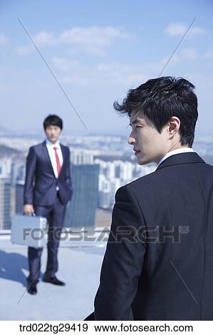 business rivals directly facing each other View Large Photo Image Stock Photo - business rivals directly facing each other. Fotosearch