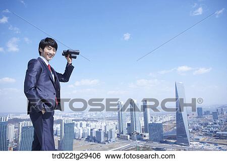 businessman see the scape through the telelscope View Large Photo Image Stock Photograph - businessman see the scape through the telelscope. Fotosearch