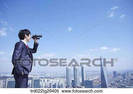 businessman see the scape through the telelscope View Large Photo Image Stock Photography - businessman see the scape through the telelscope. Fotosearch