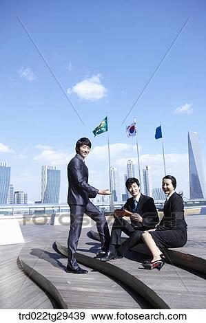 businessman talking on the stairs View Large Photo Image Stock Photo - businessman talking on the stairs . Fotosearch