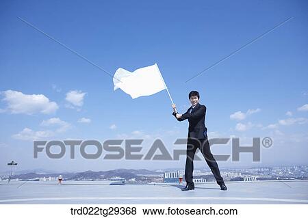 Stock Photo - businessman waves flag. Fotosearch