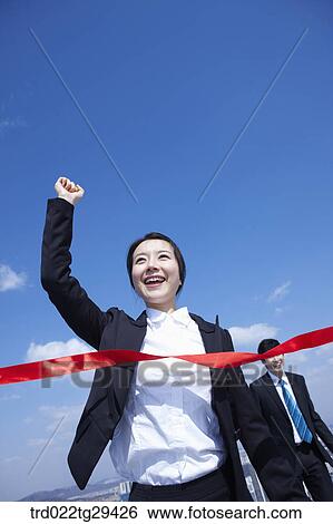 businessman won the race raising her arm View Large Photo Image Stock Photograph - businessman won the race raising her arm. Fotosearch