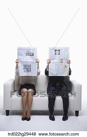 businesspeople reading newspaper View Large Photo Image Stock Photo - businesspeople reading newspaper. Fotosearch