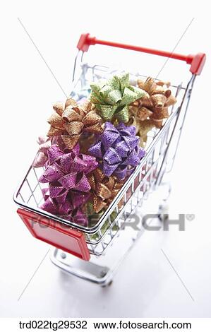 decorated ribbons in shopping cart View Large Photo Image Stock Image - decorated ribbons in shopping cart. Fotosearch