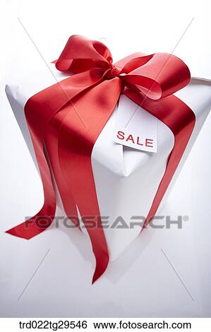 Stock Photograph - decorated ribbons on the gift box. Fotosearch