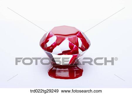 Stock Photo - red color paint on the dishes. Fotosearch