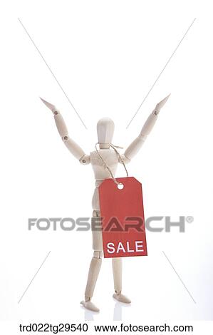 wooden doll holding sale tags View Large Photo Image Stock Image - wooden doll holding sale tags. Fotosearch